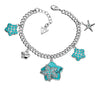 GUESS Armband Handkette UBB41203 versilbert mit türkisfarbenem Charm Anhängern