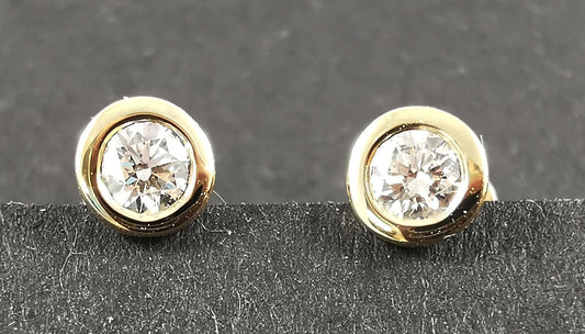 VIVA Ohrringe Gelbgold 9 kt - Gewicht 0,69 gr. - Ohrstecker rund - Brillanten 0,20 ct w/si